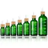 Botella gotero de 30 ml con punta de goma para dispensar aceite esencial, botella gotero con veta de madera, botella de vidrio verde de 15 ml con gotero de escala serigrafiado