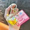 Llavero Estrella de Gominola Relleno de Aceite Acrílico Llavero de Arena Movediza Líquida Colgante para Bolso de Coche Colgante Venta al por Mayor