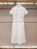 Vestido de Verano Nuevo de Alta Gama para Mujer Estilo Francés Delgado Bordado Hueco de Manga Corta de un Solo Botón en Shenzhen Nanyou