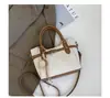 Bolso de mano de moda transfronterizo con temperamento, bolso tipo cubo para mujer, bolso de mano de alta gama versátil para el trabajo, bolso retro de un solo hombro cruzado