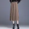 Moda de falda plisada para mujer, nuevo estilo otoño e invierno 2026, cintura alta elástica, adelgazante, de longitud media, falda de línea A elegante y versátil