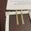 Pendientes Elegantes de Moda de Gama Alta de Nicho Accesorios para Orejas Tendencia Gymnopus Pendientes Largos con Borlas Brillantes para Mujer