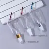 Garrafa Extrudada de Fábrica 30ml Garrafa Recarregável Garrafa Flip-Top Mosquetão para Viagem ao Ar Livre Portátil Plástico Atacado Frasco Spray
