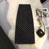 Falda midi de lunares negros para mujer, nueva colección primavera/verano, de cintura alta, adelgazante, ajustada al cuerpo, con abertura y diseño de línea A