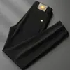 Nuevos Jeans de Pierna Recta Elásticos Ajustados Blancos de Tres Pruebas de Estilo Europeo de Lujo Ligero para Otoño e Invierno Marca de Tendencia para Hombre