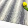 Venta caliente tela de lino y algodón teñida en hilo a rayas suave transpirable algodón ropa para niños vestido camisa de mujer tela a rayas