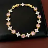 Pulsera con Cierre Redondo de Flor de Circonia Bañada en Oro Real de 18K, Pulsera de Nicho de Lujo Ligero, Joyería de Mano Exquisita y Elegante al por Mayor