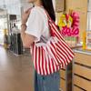 Bolsa de Lona Listrada de Verão Nova Feminina Coreana Ins Bolsa Tote para o Dia a Dia Estilo Preguiçoso Carta Bolsa de Ombro Dupla Face