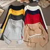 Nuevo Estilo Puro Lustre de Principios de Otoño Camiseta de Manga Larga con Diseño de Botones de Cuello Bajo Estilo Fijo que Adelgaza Top para Mujer con Estilo Adelgazante y Almohadillas en el Pecho