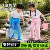 Pantalones de lluvia desechables para niños con cubrepiés, cubrepiernas impermeables de medio cuerpo engrosados para uso en rafting al aire libre y parques de atracciones, impermeable separado