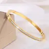 Colección de Pulseras de Acero de Titanio de Lujo Ligero Europeo y Americano Madreperla Números Romanos Diamante Completo Múltiples Estilos Suministro Directo de Fábrica Soporta Dropshipping