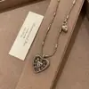 Collar largo de cadena dorada con colgante de corazón de plata gruesa, estilo retro-chic, collar vintage único de alta gama estilo ins