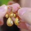 Nuevos Pendientes Clásicos Versátiles de Zirconia Color Café Granate Flor de Loto Tres Vidas Tres Adoraciones para Mujer, Pendientes Versátiles de Moda de Alta Gama