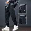 Pantalones de chándal gruesos para hombre con forro polar, holgados, con cordón, pantalones casuales, pantalones deportivos versátiles, marca moderna, pantalones largos versátiles