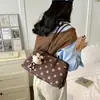 Bolso de lunares elegante transfronterizo de comercio exterior para mujer, nuevo, de alto valor, nicho, para ir al trabajo, bandolera, bolso de hombro versátil y moderno