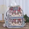 Bolsa de jacquard bordada en lienzo estilo étnico de Yunnan, funda de sofá, mochila casual de viaje para mujer, mochila bordada con hilo dorado, bolso de pecho