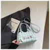 Bolso de mujer lindo de nicho súper popular 2026 nueva moda bolso cruzado versátil bolso de mano mini exquisito bolso tipo cubo