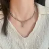 Elegante Temperamento Francés Diseño Simple Moño Perla Swarovski Collar Cadena Clavícula Moda de Alta Gama Lujo Ligero