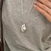 Cadena larga para clavícula estilo minimalista de plata con forma de gota de agua para mujer, nuevo modelo 2026, elegante y versátil para el trabajo, accesorio de collar ajustable