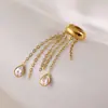 Wanxing Europa y América Acero Inoxidable Chapado en Oro de 18 Quilates Blanco Gota de Agua Circonita Cúbica Arete Largo con Borla para Mujer Lujo Ligero Venta al por Mayor Transfronteriza