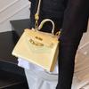 Bolso Pequeño Kelly de Gama Alta con un Toque Vintage, Bolso para Mujer con Hebilla de Cierre Niche 2026, Bolso de Mano Elegante para Hombro Cruzado