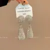 Pendientes de Gota de Agua Completamente de Diamante para Industria Pesada Europea y Americana Moda Femenina Lujo Ligero Pendientes Geométricos de Diamante Super Brillantes Pendientes de Temperamento Elegante