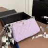 Nueva bolsa de mahjong con forma de estrella 25B estilo Chanel con cadena plateada y hebilla de pedrería, bolso cruzado acolchado con cadena al hombro