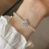 Nuevo brazalete tejido con cuentas estilo sal de nicho con un toque único de alta gama, moderno y elegante, versátil y personalizado