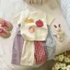 Camiseta de Manga Corta para Niña, Nueva de Verano 2026, Versátil, Linda, Moderna, Cuello Redondo, Estampado de Dibujos Animados