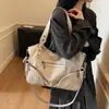 Bolsa Tote Transfronteiriça Mais Vendida de Grande Capacidade para Mulheres com Sensação de Alto Padrão, Luxo Leve, Tendência, Doce e Cool, Bolsa de Ombro Estilo Biker, Versátil 2026
