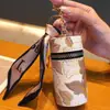 Bolsa de moedas criativa estilo nacional moda balde pequena transparente flor portátil fone de ouvido boca envelope vermelho chave do carro pingente