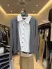Chegada nova de outono estilo coreano, estilo old money de Dongdaemun coreano, design falso de duas peças, combinação de camisa de algodão e linho com suéter de tricô para mulheres