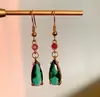 Pendientes de estilo transfronterizo con diseño de castillo móvil de Hal, con forma de gota de agua de cristal verde a la moda para mujer, con clip para la oreja