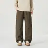 Pantalones casuales retro de algodón puro estilo americano para hombre, con un diseño único de patchwork deconstruido, corte holgado, perneras rectas y una silueta amplia y fluida, adecuados para primavera y otoño.