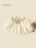 Camisa de Muñeca de Algodón Puro para Niñas Otoño 2026 Primavera y Otoño Nueva Moda Estilo Coreano Camisa Superior Clase A para Bebés Niñas 3