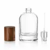 Botella de vidrio dispensadora de perfume 10/20/30/50/100ml con tapa de madera, botella vacía con atomizador, recipiente dispensador portátil para viajes