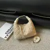 Bolso de mano retro de punto de cadeneta para nicho pequeño 2026 nuevo elegante de gran capacidad para el trabajo diario bandolera