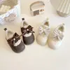 Zapatos de Algodón para Niños 2026 Invierno Nuevo Estilo Niñas Felpa Adentro Cálidos Zapatos de Bebé Niñas Pequeñas Moño Princesa Botas de Algodón Modernos