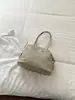 Bolso de mano cruzado de diseño coreano de nicho para mujer, bolso de hombro simple para el día a día, nuevo lanzamiento Otoño 2026