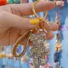 Net vermelho diamante violento urso carro controle remoto corrente anel cordão chaveiro pingente personalidade casal saco pendurado atacado