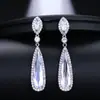 Temperamento de moda europeo y americano Pendientes de circonita con forma de gota de agua bohemia para mujer Hermosos pendientes de Ropa de calle Ruili fábrica directa oreja