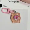 Lindo Llavero Luminoso Translúcido con Forma de Despertador, Dulce Colgante de Dibujos Animados Sanrio, Accesorio Colgante para Mochila de Estudiante