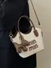 Bolsas de Mujer Transfronterizas 2026 Nueva Moda Tendencia Bolso Cubo de Paja con Letras Versátil Bolso de Hombro y Cruzado para la Playa