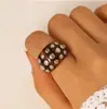 Pulsera de resina tachonada con diamantes estilo punk europeo y americano, pulsera abierta de doble fila tachonada con degradado ámbar de moda