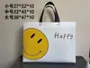 Bolsa no tejida de color spot recubierta con prensado en caliente bolsa de regalo publicitaria bolsa de compras de ropa no tejida portátil impresión de logotipo