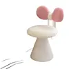 Taburete de maquillaje giratorio estilo crema para dormitorio de niñas, silla de tocador de alta gama con respaldo moderno en forma de lazo