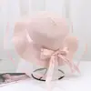 Nuevo Sombrero de Paja para Mujer Verano Viaje Sombrilla Sombrero Playa Mar Protector Solar Sombrero Estilo Coreano Ala Ancha Moño Anti-UV