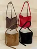 Bolso tipo cubo minimalista estilo coreano Shuai Mi Jia, nuevo modelo otoño 2026, bolso de hombro de alto valor estético, bolso de hombro único y moderno