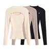 Camiseta básica de cuello medio alto negra para mujer, nuevo estilo otoño 2026, suéter de punto interior sexy y elegante con diseño hueco de alta gama