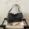 Bolso de mano retro de gran capacidad, nuevo estilo 2026, bolso de hombro versátil para mujer para el trabajo, bolso casual de moda, bolso hobo de moda